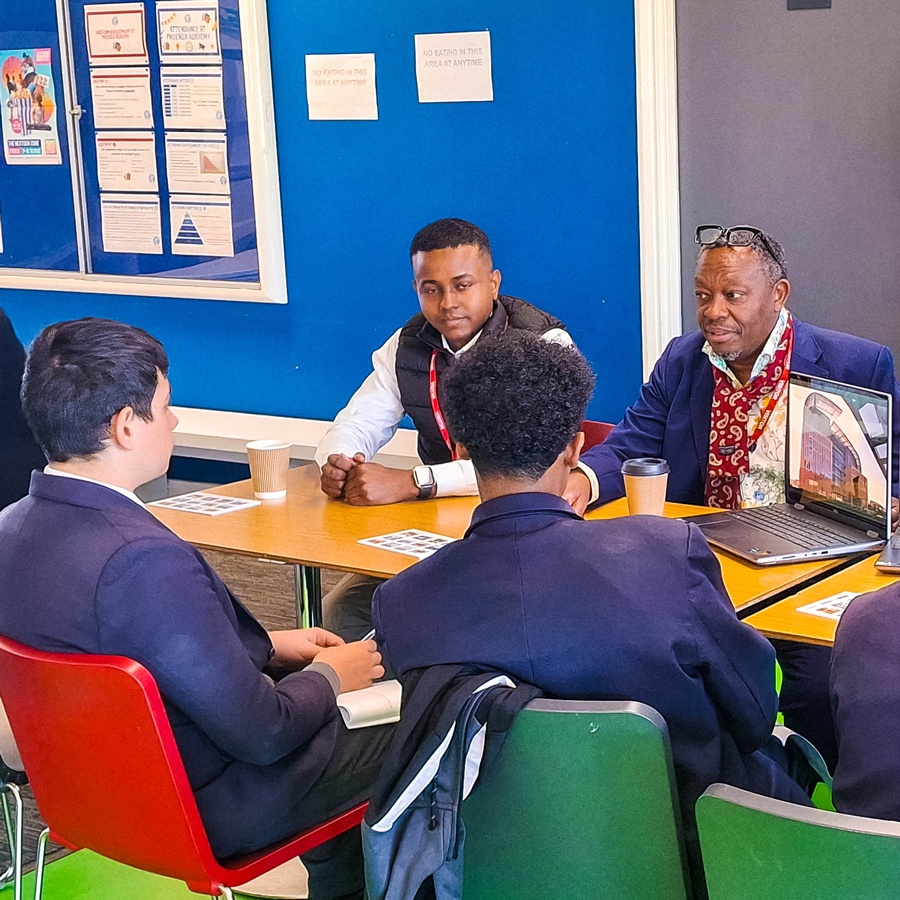 HOK's Femi Oresanya mentoring students at the Phoenix Academy Careers Event in London