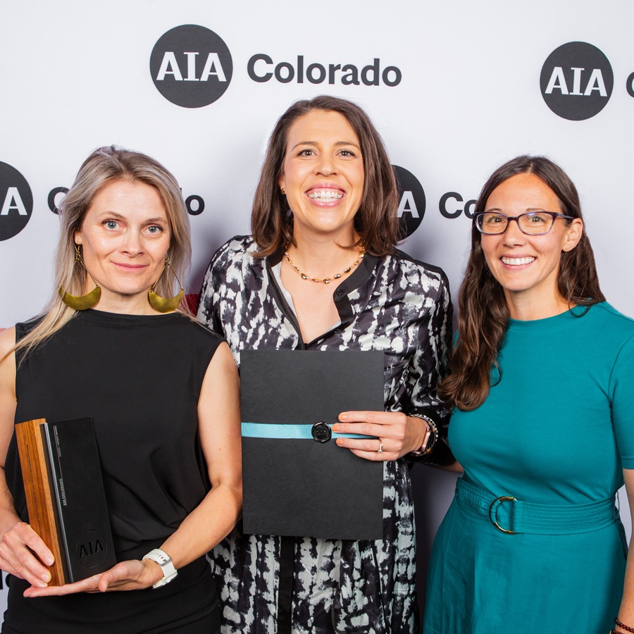 HOK Denver team members accepting an AIA Honor Award through AIA Colorado