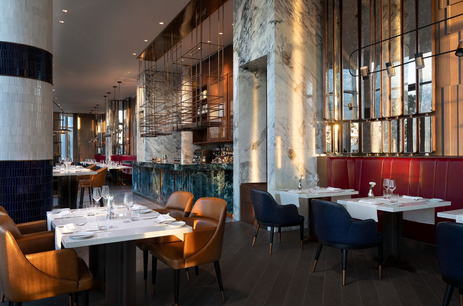 Restaurant at St. Regis Belgrade Hotel with marble walls and tables