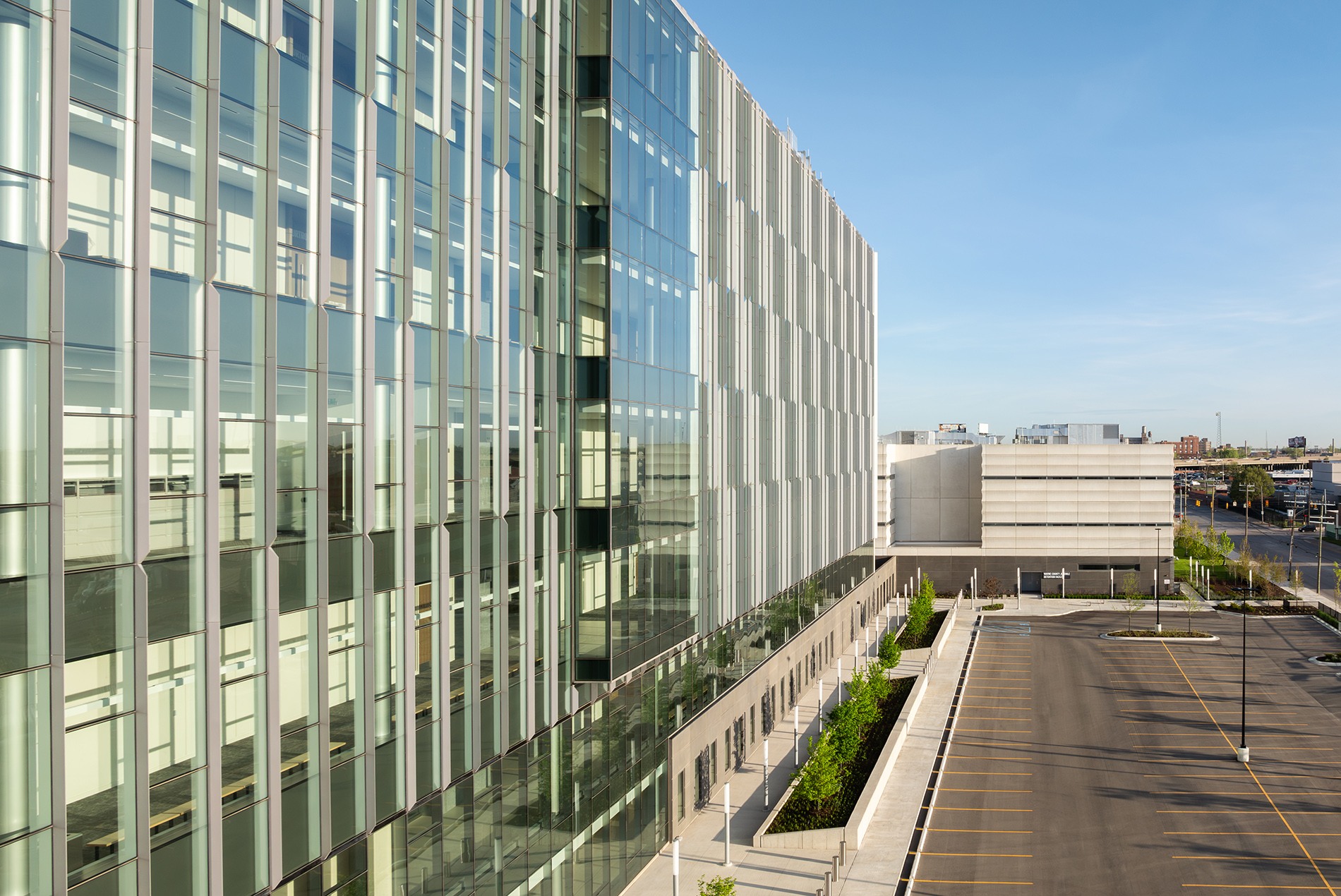The courthouse glass curtain wall of the Wayne County Justice Center Detroit Michigan HOK