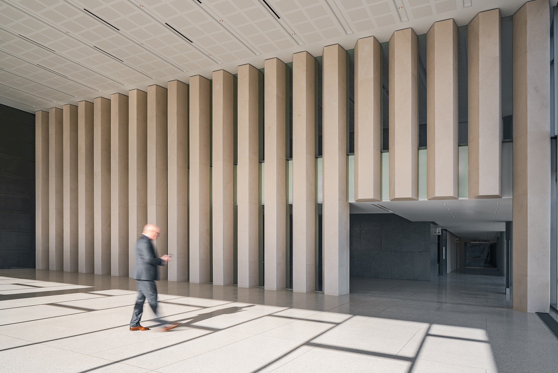 Stone partitions in the atrium at the Wayne County Justice Center Detroit Michigan HOK