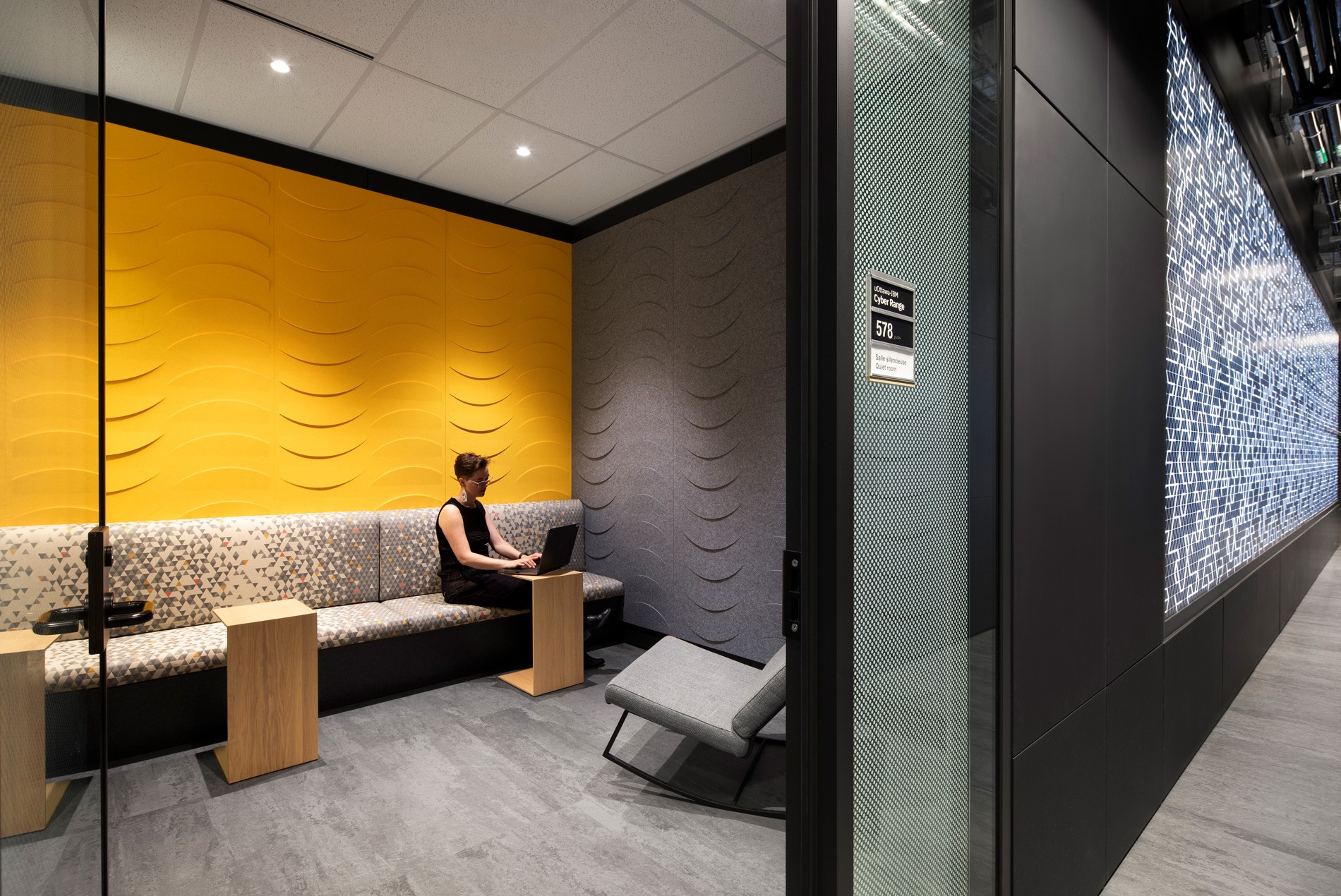 A quiet room filled with plush seating and work spaces at the University of Ottawa's new Cyber Range.