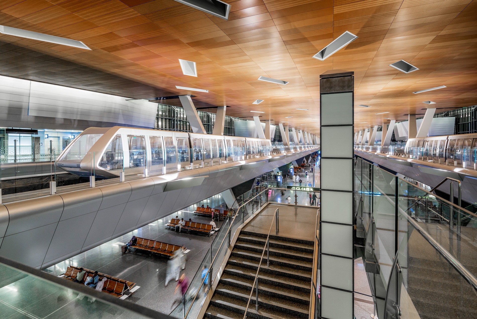 Intermodal transit system within the concourse at HOK-designed Hamad International Airport