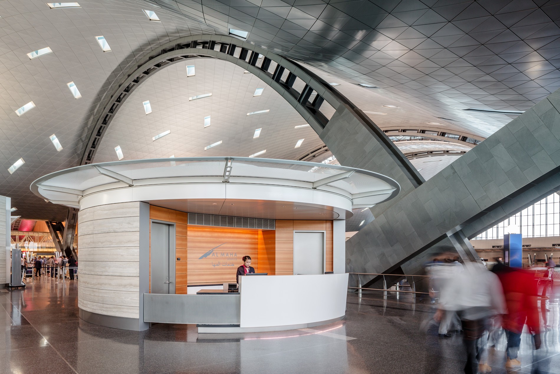 HOK-designed customer service kiosks within the departures hall at Hamad International Airport