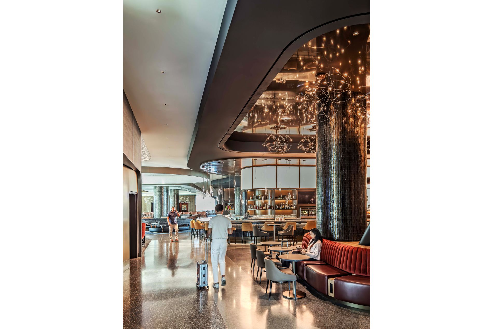 Twinkling lights and a wraparound bar at the new Delta Sky Club in Salt Lake City International Airport's concourse B.