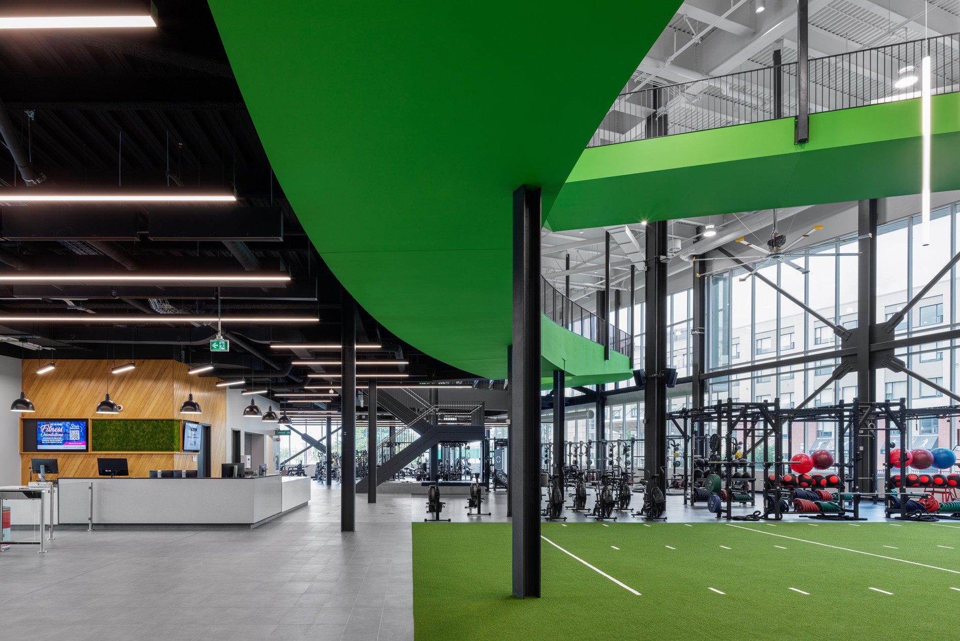 Weights and cycling space at the HOK-designed Algonquin College Jack Doyle Athletics & Recreation Centre