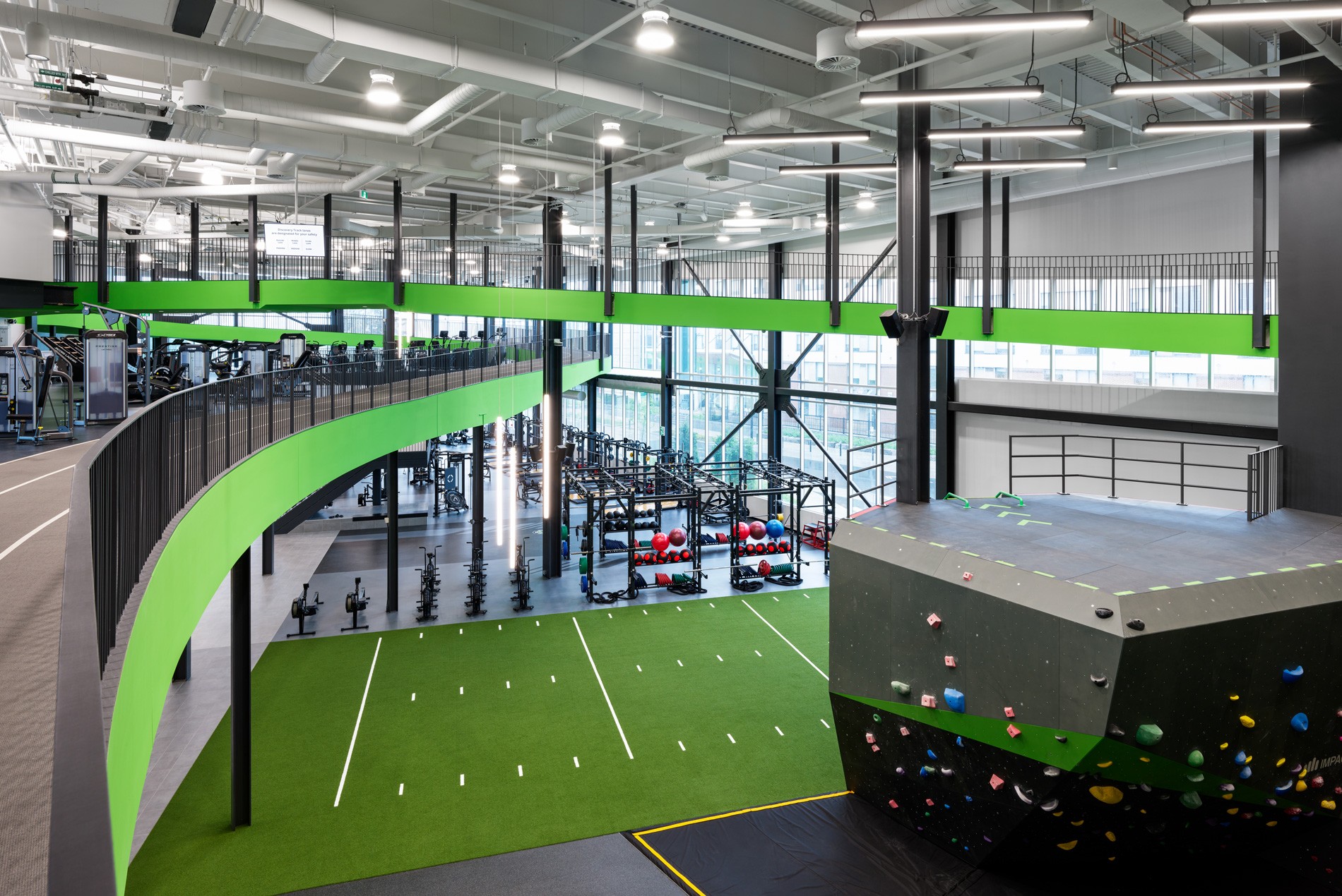Weights, rock climbing and track space at the HOK-designed Algonquin College Jack Doyle Athletics & Recreation Centre