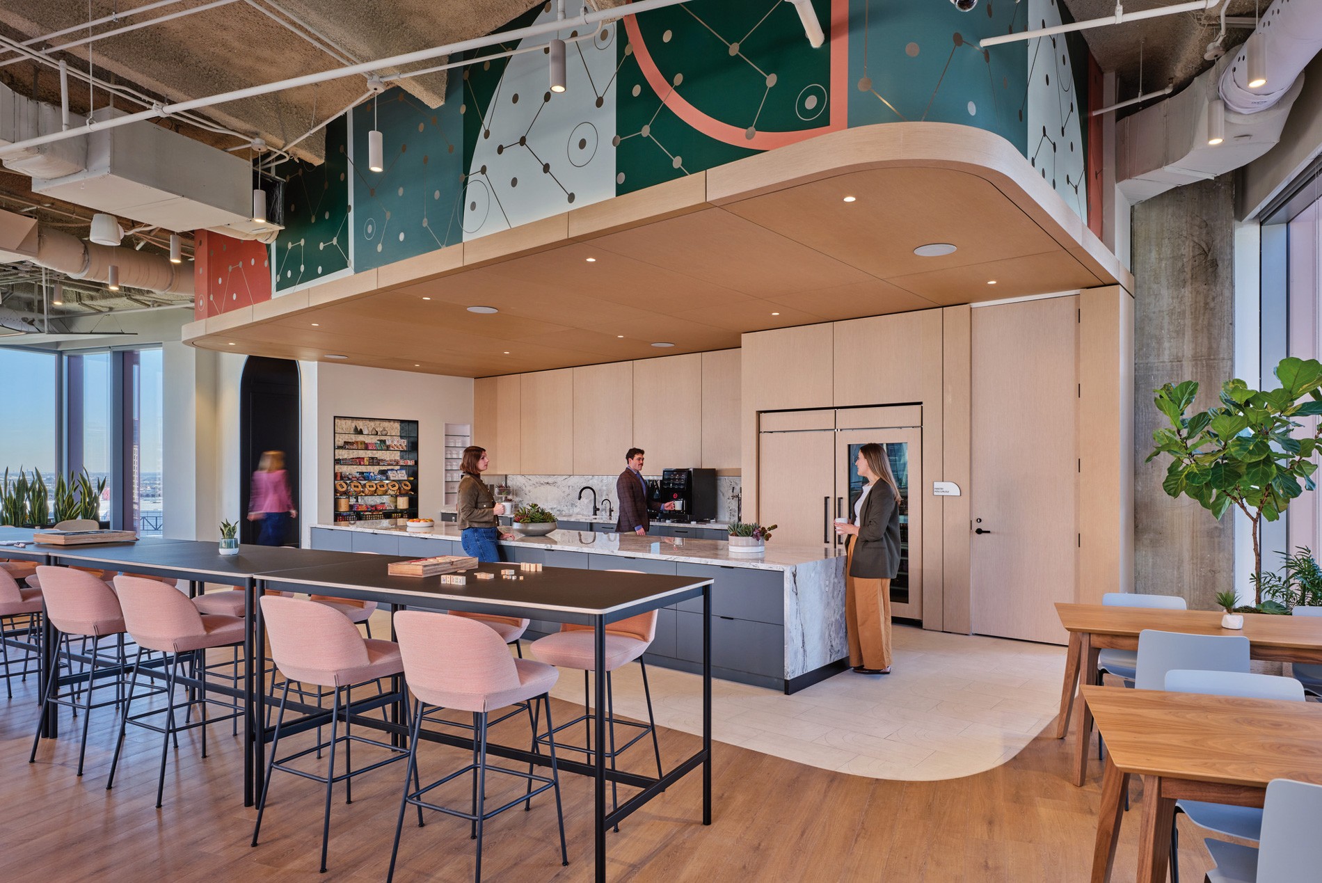 Lounge space with custom constellation-inspired graphic wallcoverings for a confidential Houston office designed by HOK