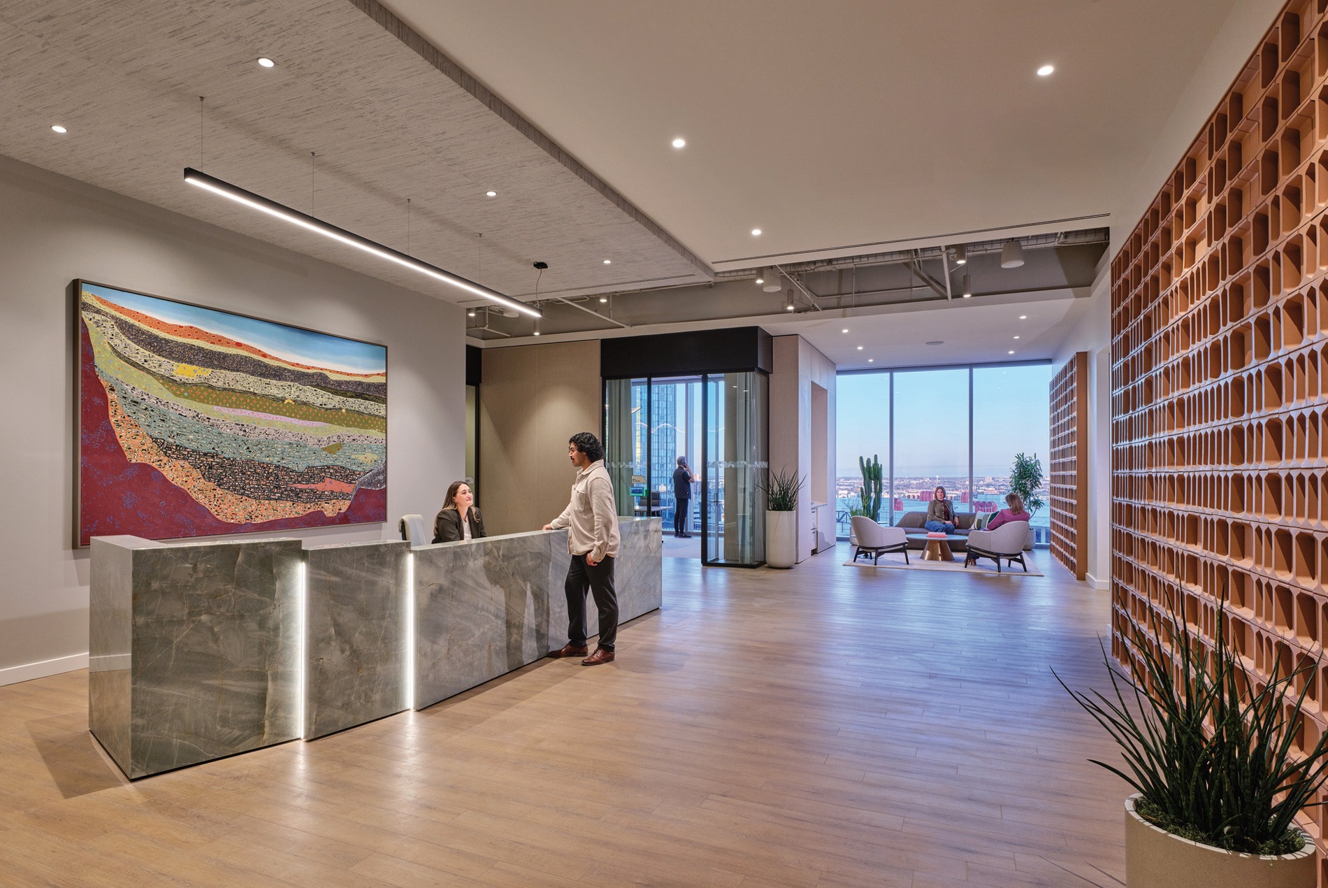 HOK-designed reception space and custom terracotta wall for a confidential Houston office