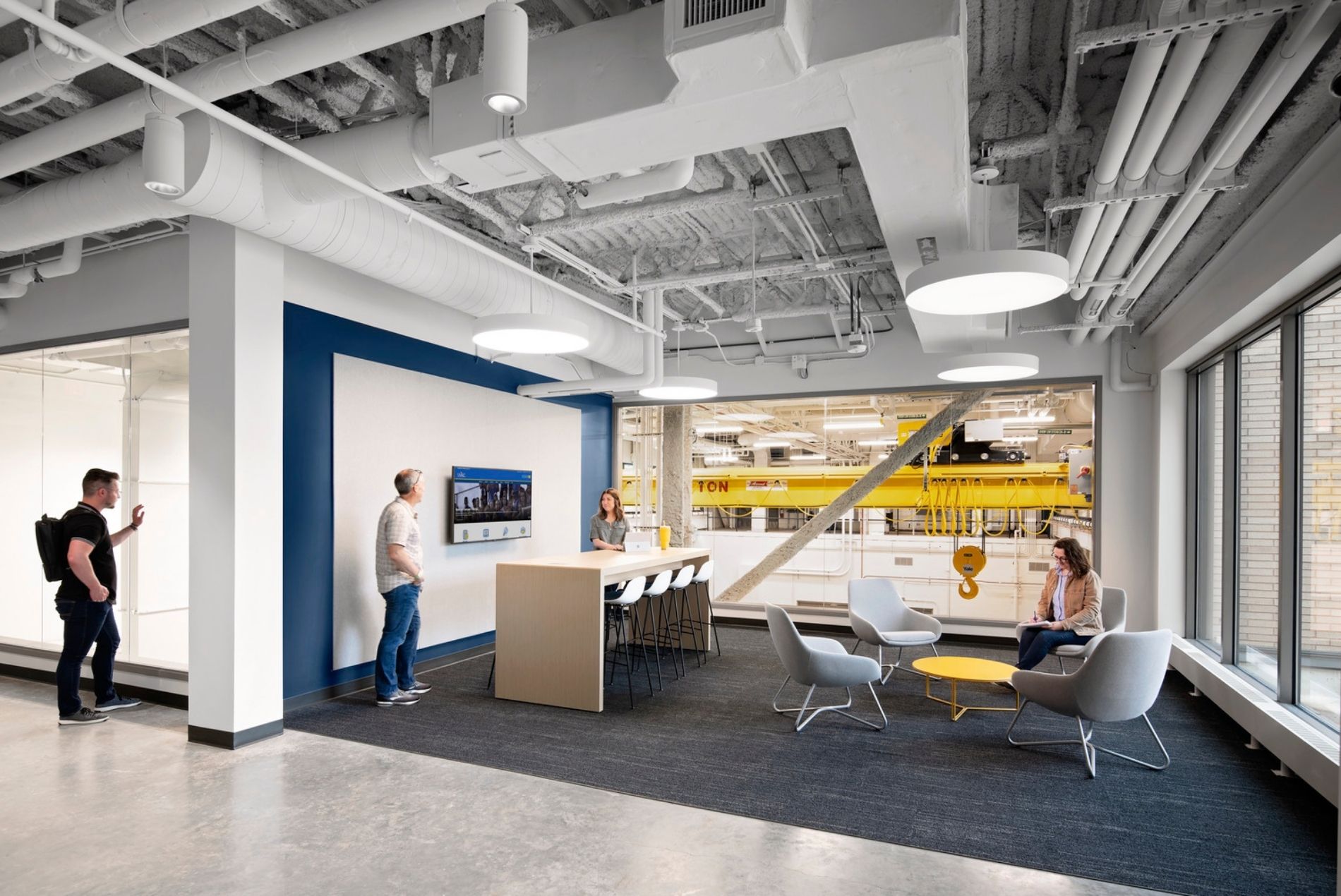 UMKC Robert W. Plaster Free Enterprise and Research Center interior common space with view to lab