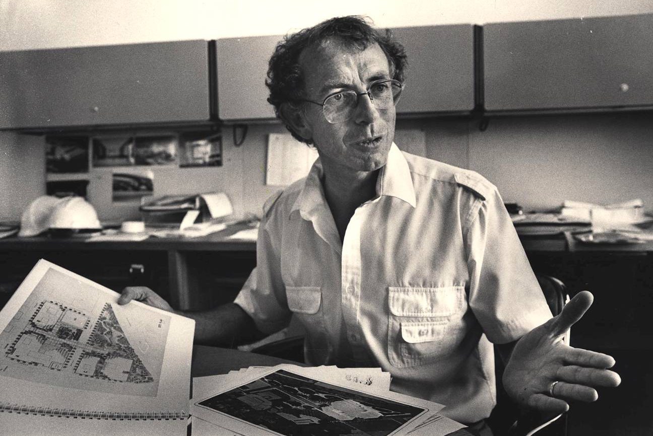 Bill Valentine at his HOK desk in the 1960s with landscape plans