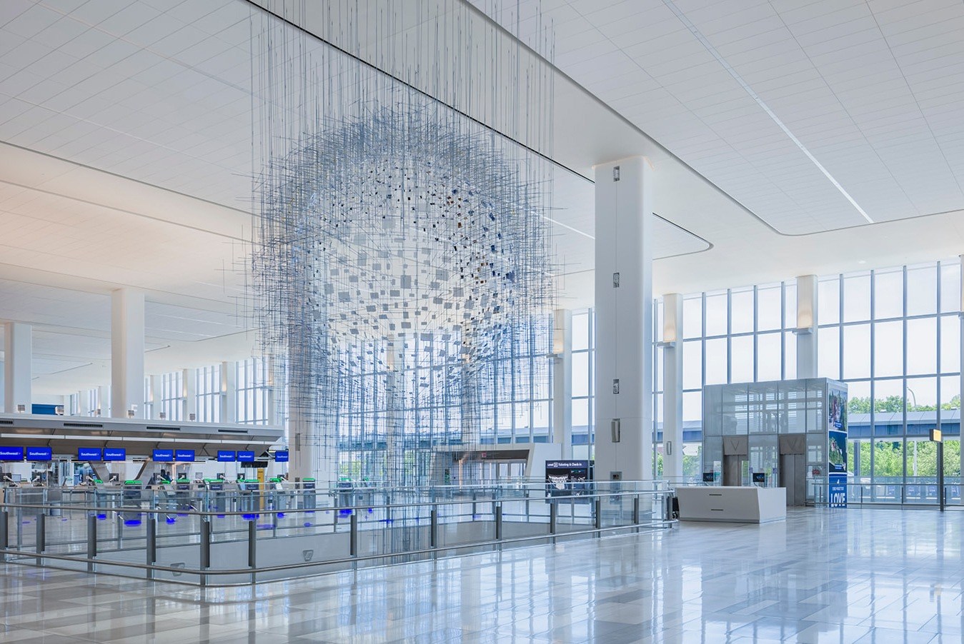 Inside the Arrivals and Departures Hall at LaGuardia Airport's Terminal B, designed by HOK.