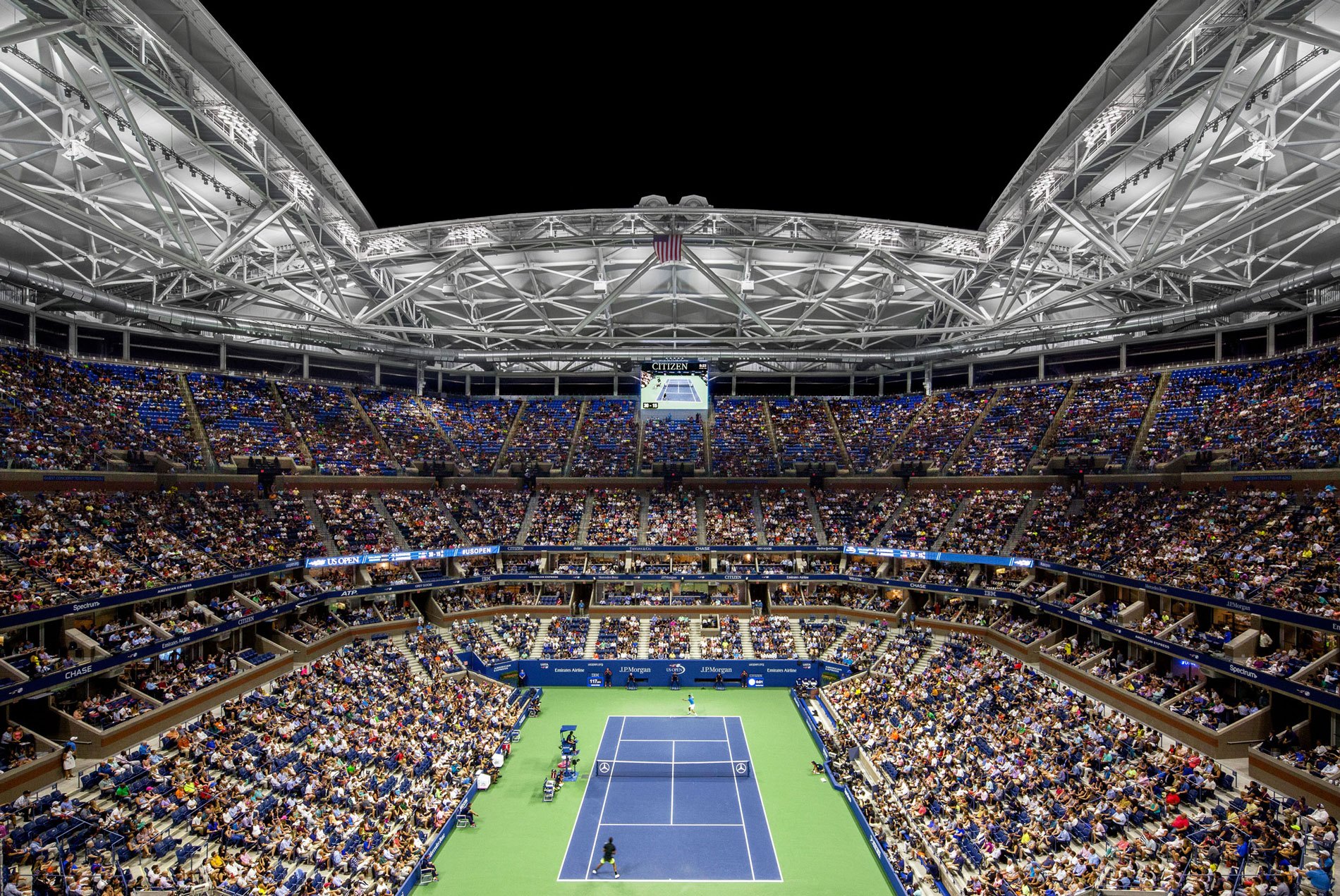 USTA Ashe Stadium with a tennis match below