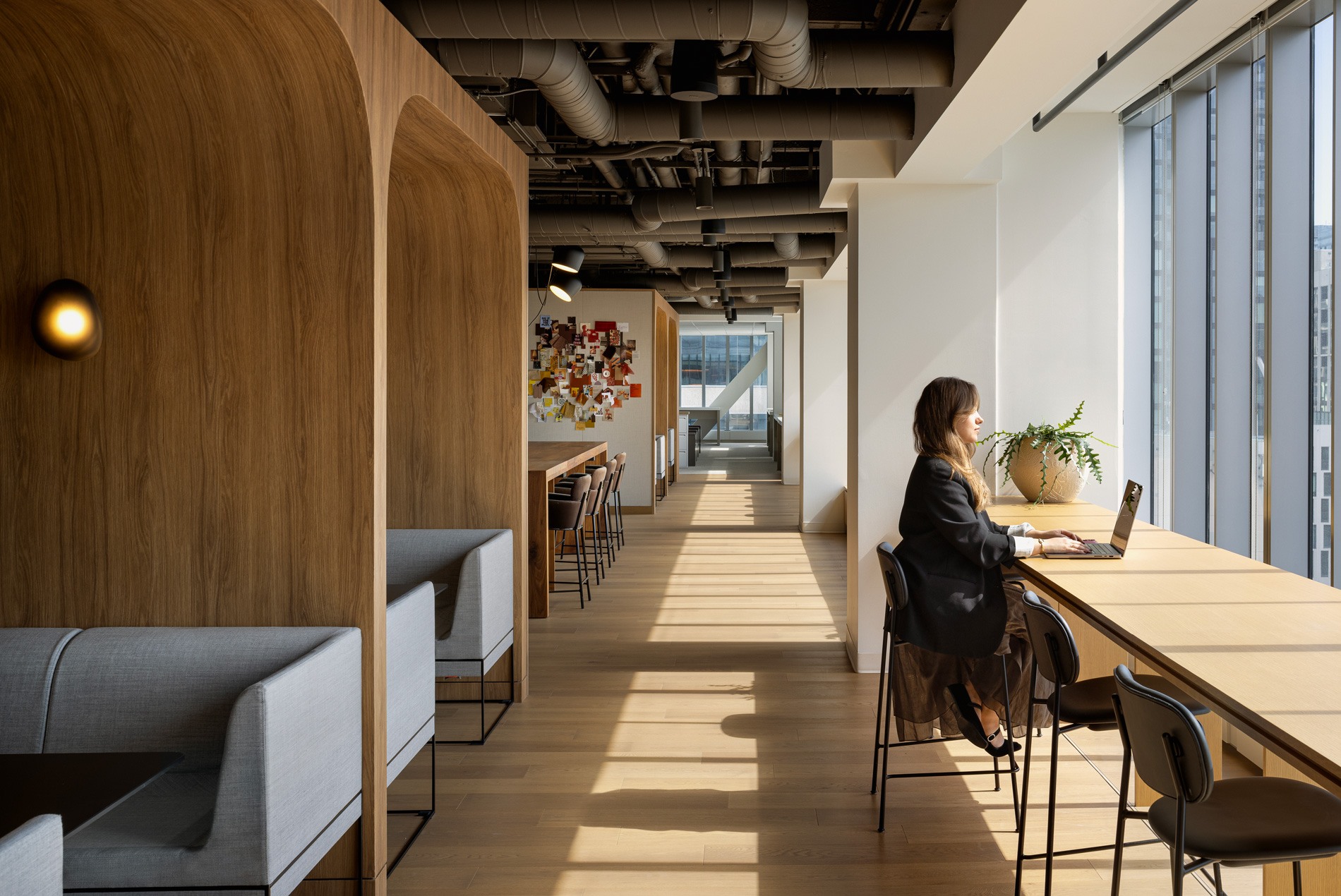 Booth and work bar settings at HOK's Toronto studio